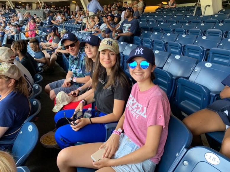 Exchange student at a baseball game with Lily