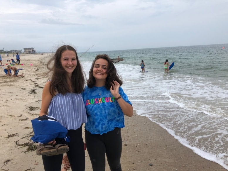 Lily and exchange student friend at the beach