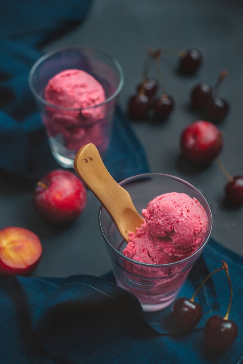 Homemade Plum Ice Cream In Transparent Glasses With Cherries And Plums. Dark Food Photography With Copy Space
