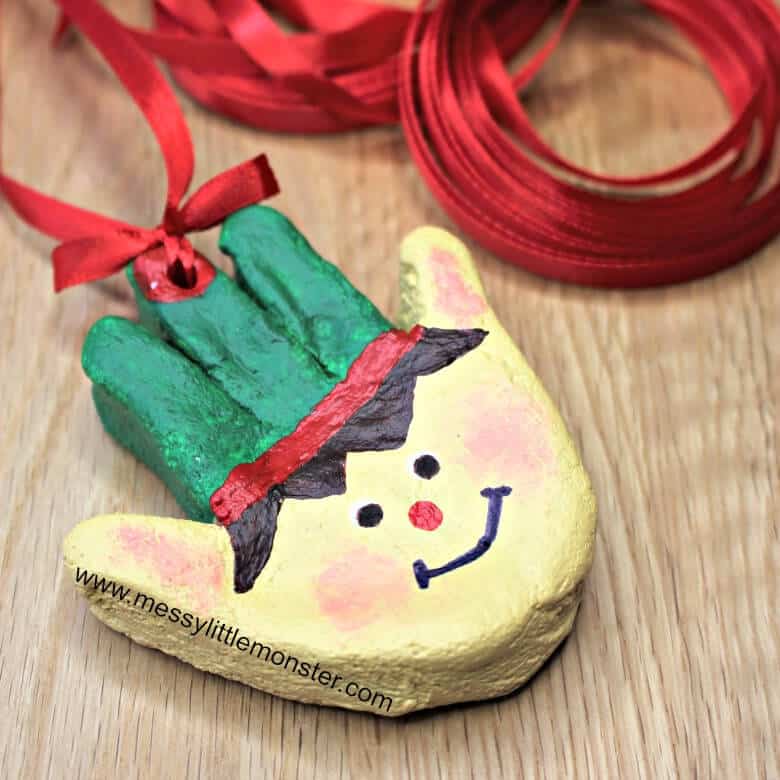 nopin="nopin" Christmas elf craft made from a toddler or baby handprint