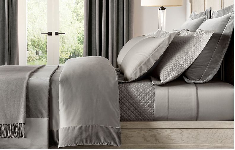 a grey RH Modern bedding set