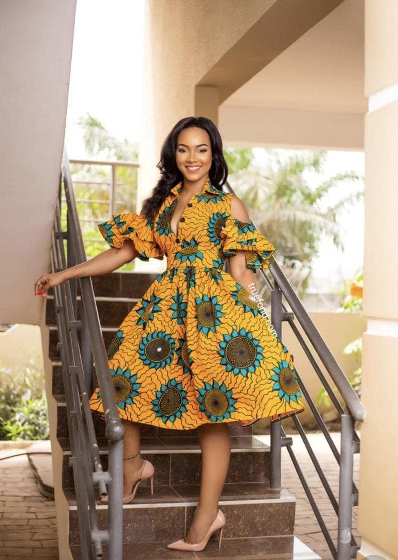 noopener A corporate sexy cold shoulder African print dress