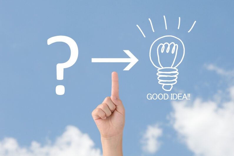 Child's hand pointing quesiton mark and light bulb illsutration with blue sky