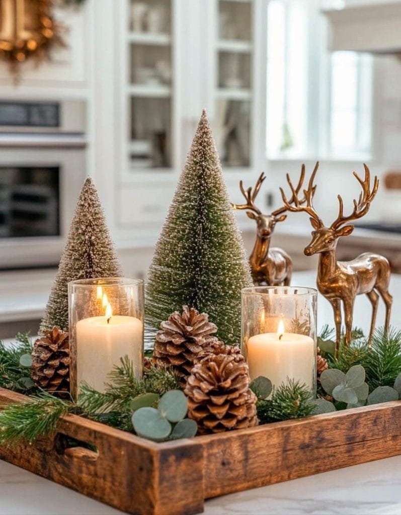 Christmas table centerpieces on a wooden tray with mini Christmas trees - pine cones and deer decorations.