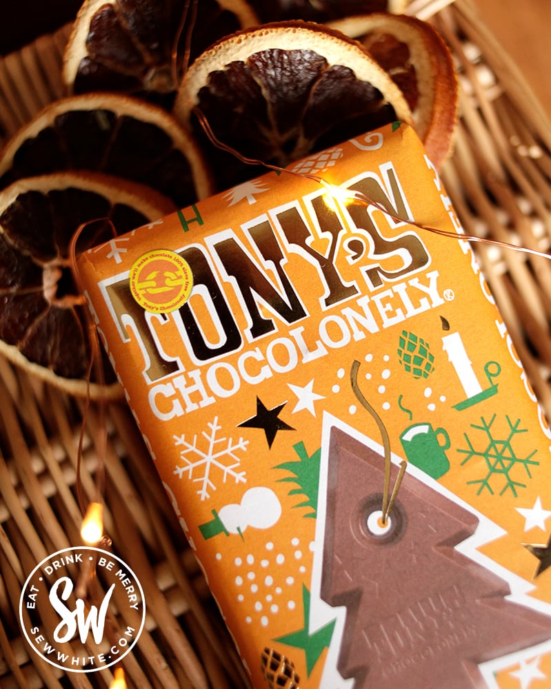 Tony's Chocolonely gingerbread chocolate bar on a wicker basket