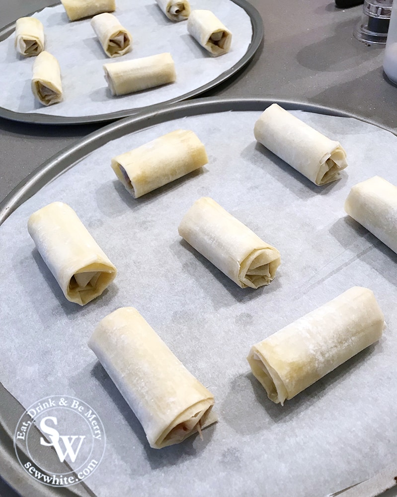 filo Mince Pie Rolls on a baking tray to be cooked