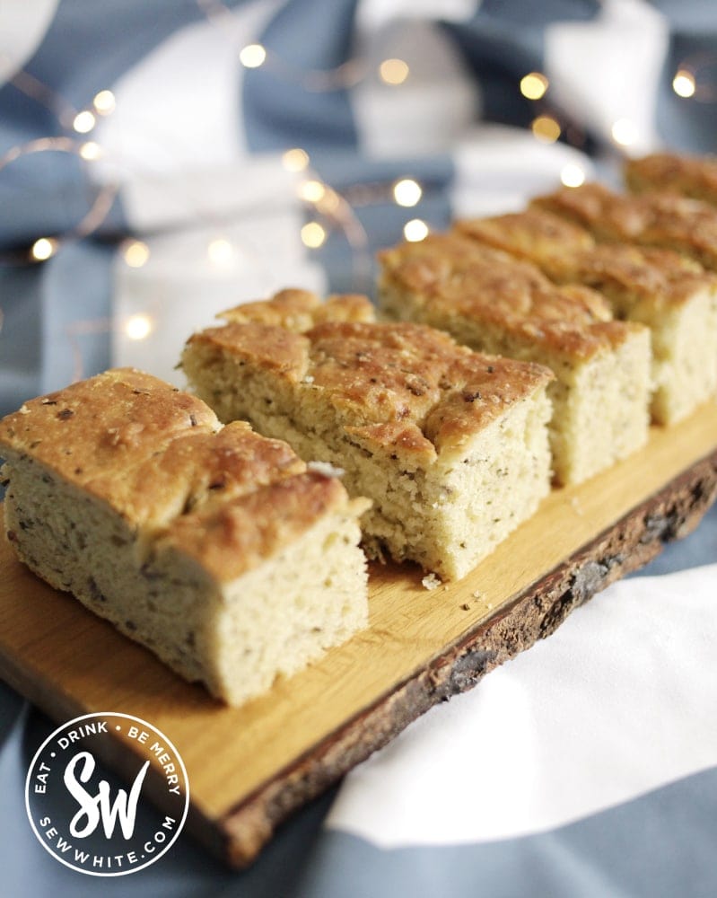 freshly baked focaccia on a wooden board