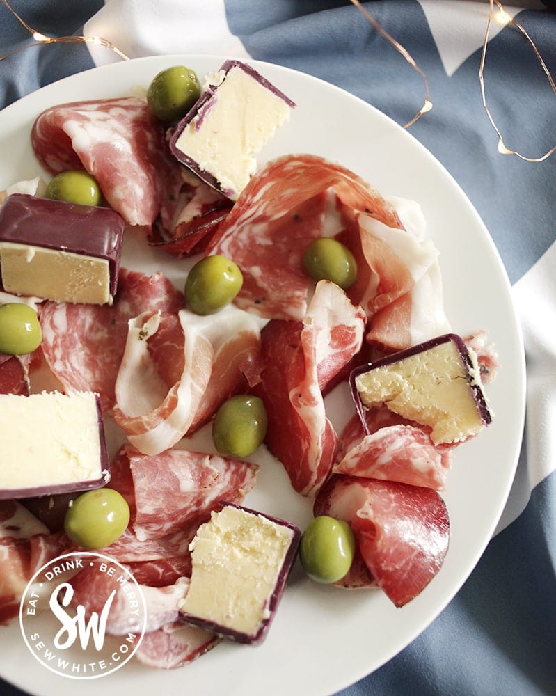 charcuterie on a white plate in the nobel house picnic range