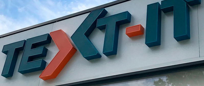 Logo van text-it referentieproject camerabewaking BitAssistence in Herenthout