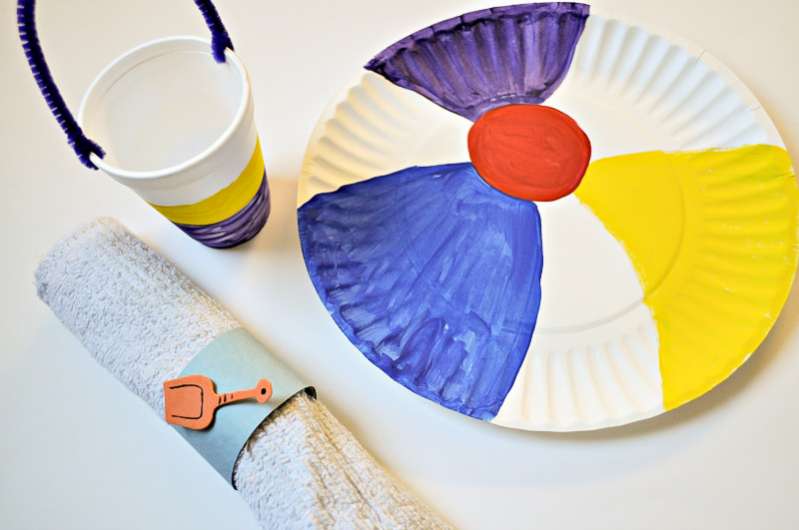 beach ball and summer craft that is multi colored for the beach