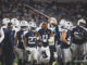 Cowboys Cheerleader Takes Football to the Head During Final Game of Season