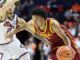 Desmond Claude scores 31 to lead Southern California over No. 13 Illinois 82-72