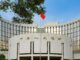 China keeps benchmark lending rates unchanged as it contends with a weakening yuan