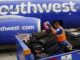 Southwest Airlines will charge to check bags for the first time, launch basic economy tickets
