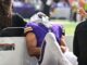 Moore, out all of ’24, hurt on first play for Vikings