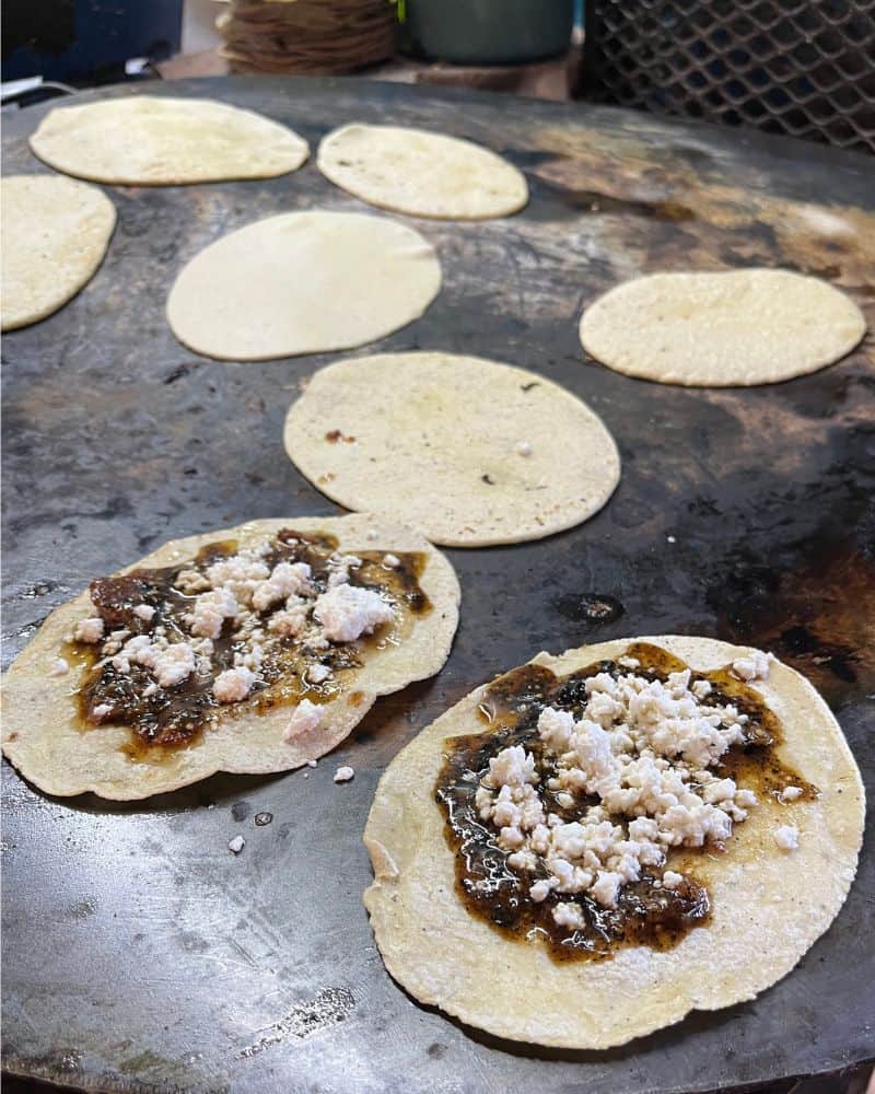 memelas on cooking comal at Memelas Dona Vale Oaxaca City Mexico