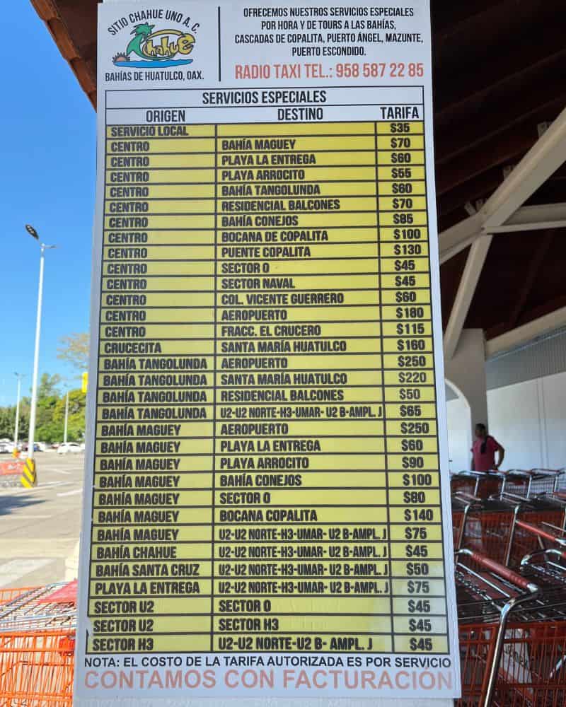 huatulco taxi rates sign
