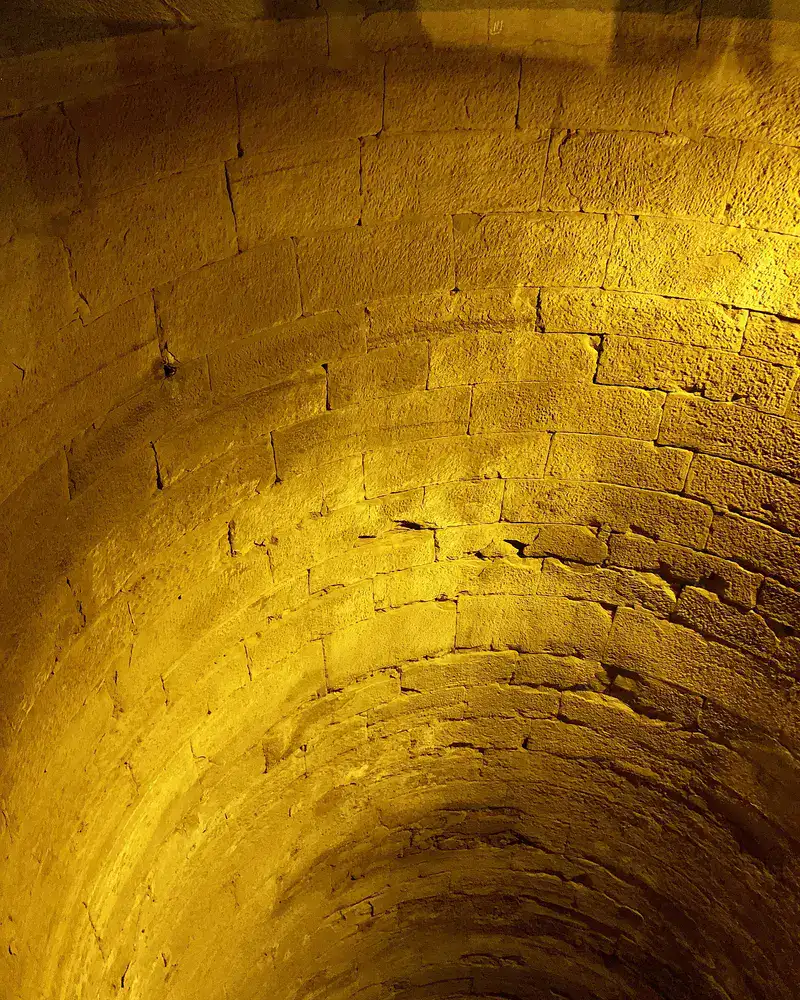 Stone staircase descending into the Kom Ombo Temple nilometer
