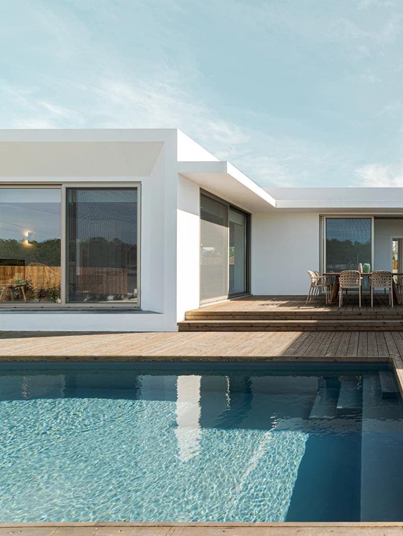 Contemporary residential home with pool, modern architecture design.