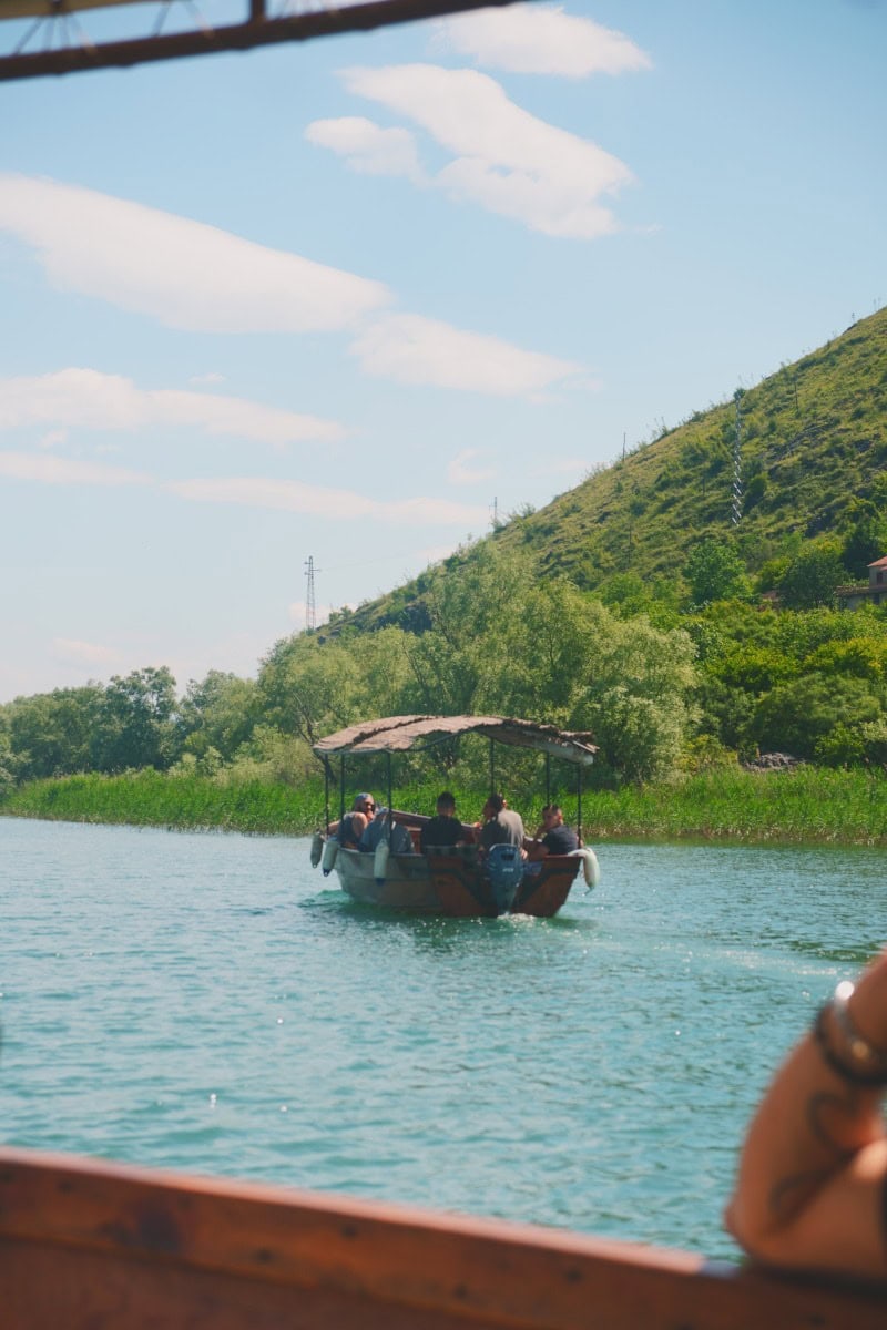 boat_gliding_lake_skadar_montenegro Boat tour on Lake Skadar near Virpazar in Montenegro
