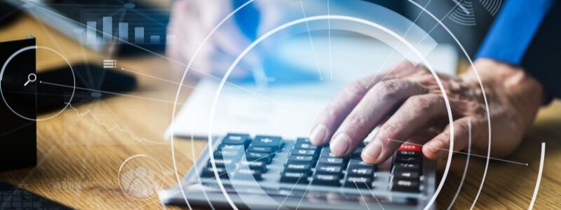 man typing on keyboard
