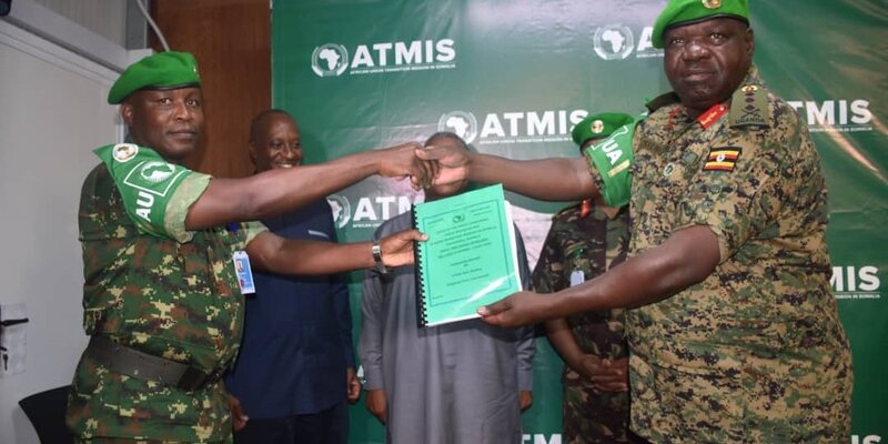 Lt Gen Okiding Hands Over ATMIS Office, Returns To Uganda As Deputy CDF gen le