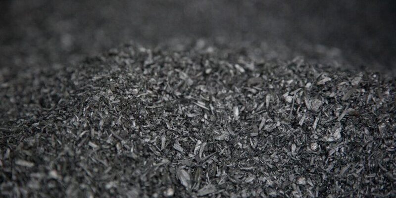 A pile of small granulate biochar produced by pyrolysis.