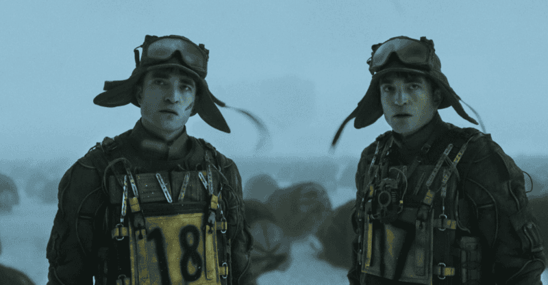Still from Mickey 17 of Two identical soldiers standing in a frozen landscape, symbolising cloning and duplication in sci-fi cinema.”
