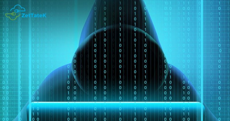 Ilustración de un atacante encapuchado con código binario, sobre ransomware en México