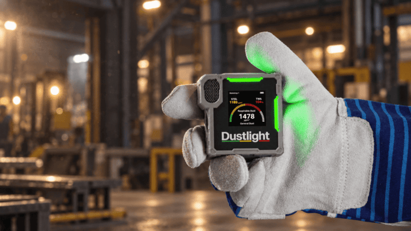 Dustlight Update Featuring STEL and TWA Displays in the Hand of an Industrial Worker