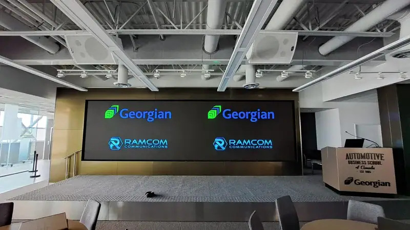 Precise DVLED cabinet alignment and Crestron integration for Georgian College education AV solutions.