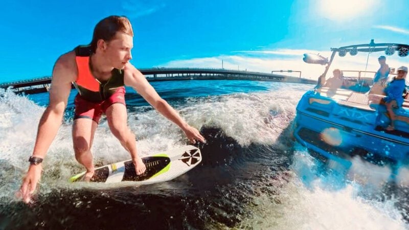 Rider learning to wakesurf on Lake Washington, Seattle