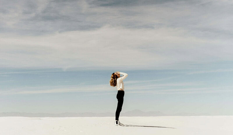 woman against a wide background