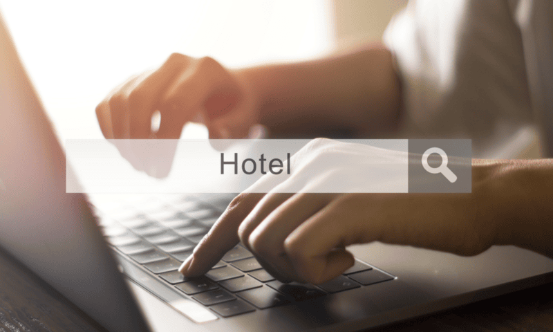 hands of parent searching for hotels