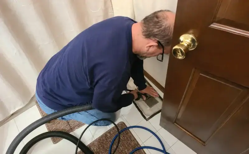 Dryer vent repair and installation technician providing professional service near your home.