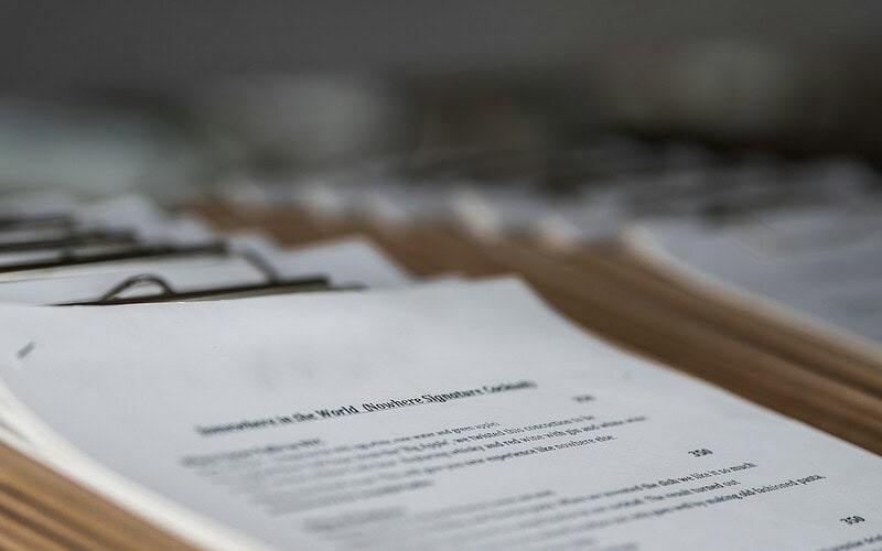 restaurant menus on clipboards close up