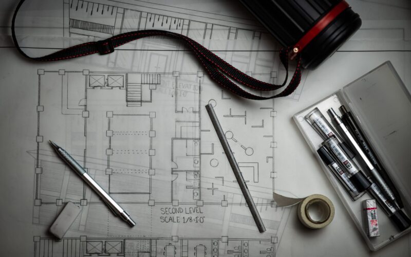 lucas-kepner-Yn8D5B8C-eY-unsplash Number 0.5, 0.7 and 0.9 pencil box hand with a draw floor plan