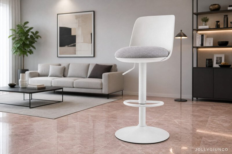 White modern bar stool with gray cushioned seat in a contemporary living room.