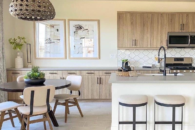 Bright kitchen with contemporary design, wooden cabinetry, and sleek appliances.