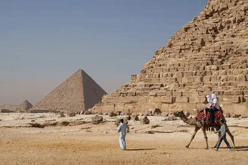 Camel ride beside the Pyramids of Khafre and Menkaure in Giza