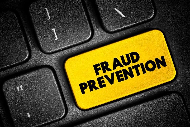 Fraud prevention - implementation of a strategy to detect fraudulent transactions and prevent these actions from causing financial damage, text concept button on keyboard