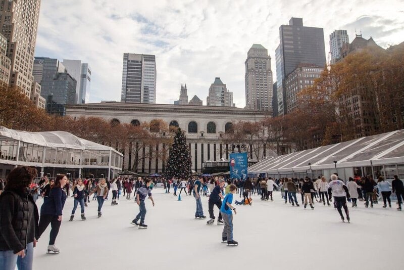 people on the ice skating rink at Rockefeller Center