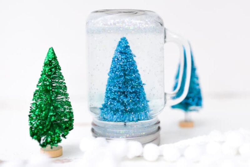 mason jar snow globe with christmas tree inside