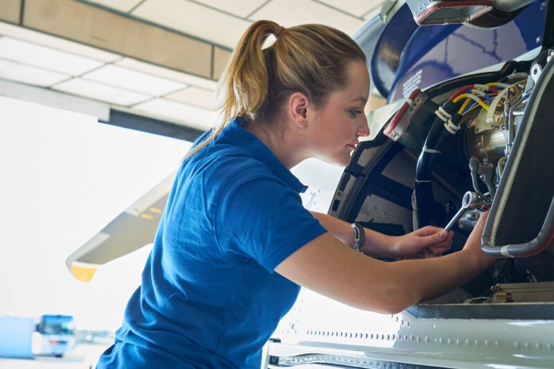 Female Aero Engineer Working On Helicopter In Hangar » The Military Connected Community Military Connected Community