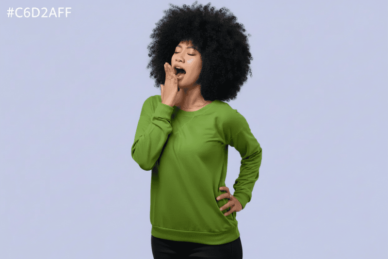 Woman with a large Afro Yawning