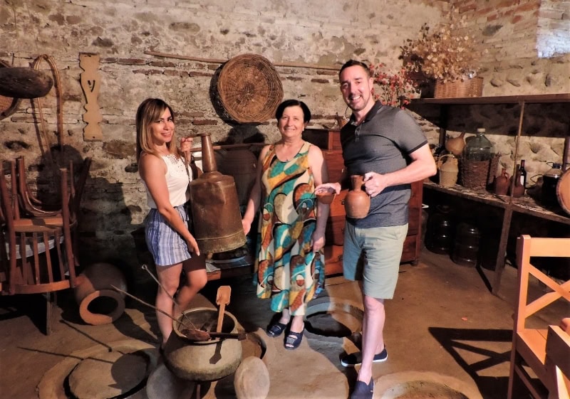 With Marta in her kitchen and dining room with wine under our feet