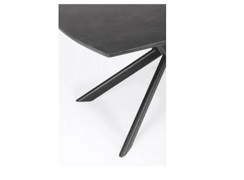 Tavolo allungabile Janika con piano nero e gambe nere, design moderno e funzionale.