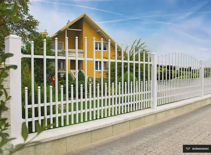 Custom white wrought iron security fence and gate fabricated by professional welders in Houston.