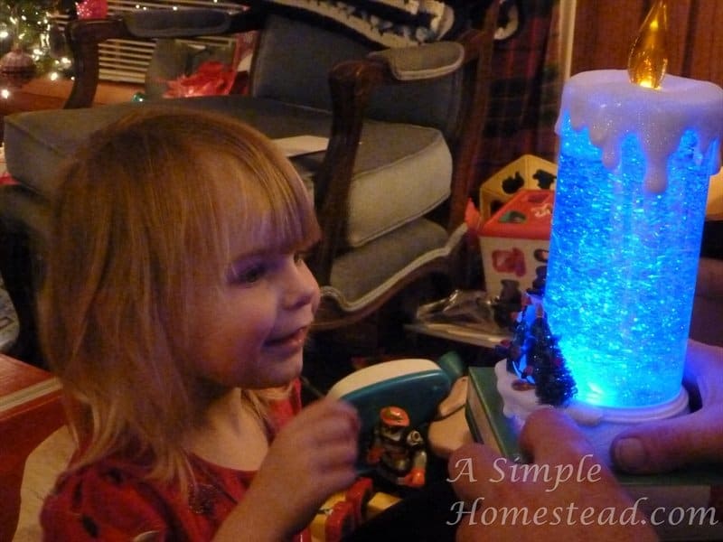 Little chick with glow candle