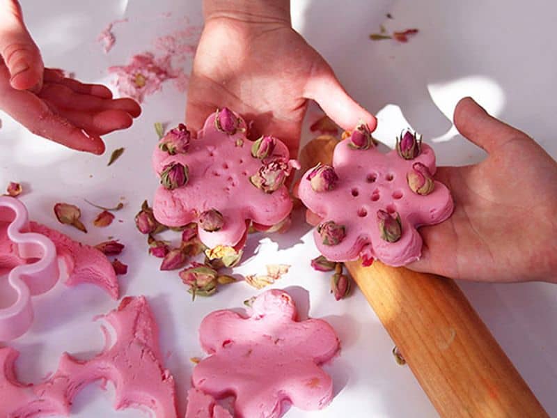 pink playdough with dried roses